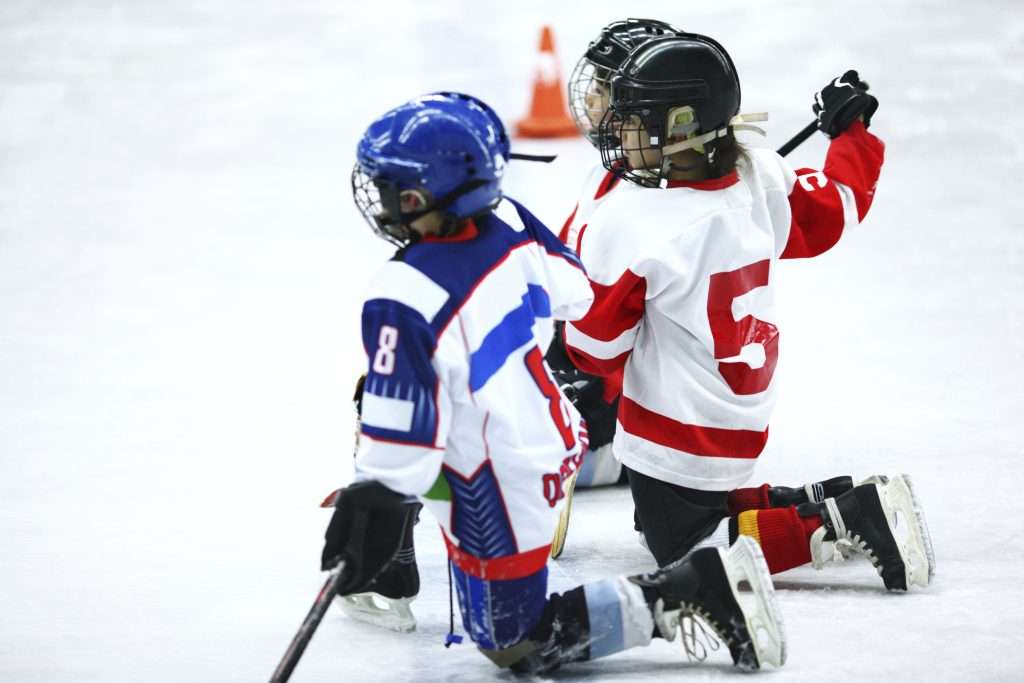 Kids at ice hockey practice at Skating Edge Ice Arena