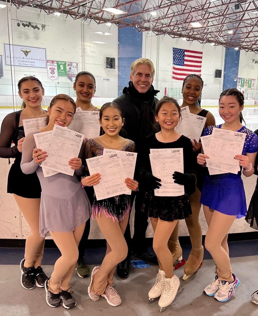 Figure skating coach Kelly Witt with students following U.S. Figure Skating tests